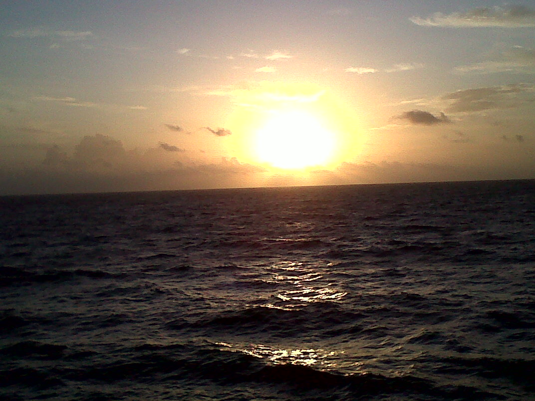 Enjoying God’s creation from sea, watching the sunrise.